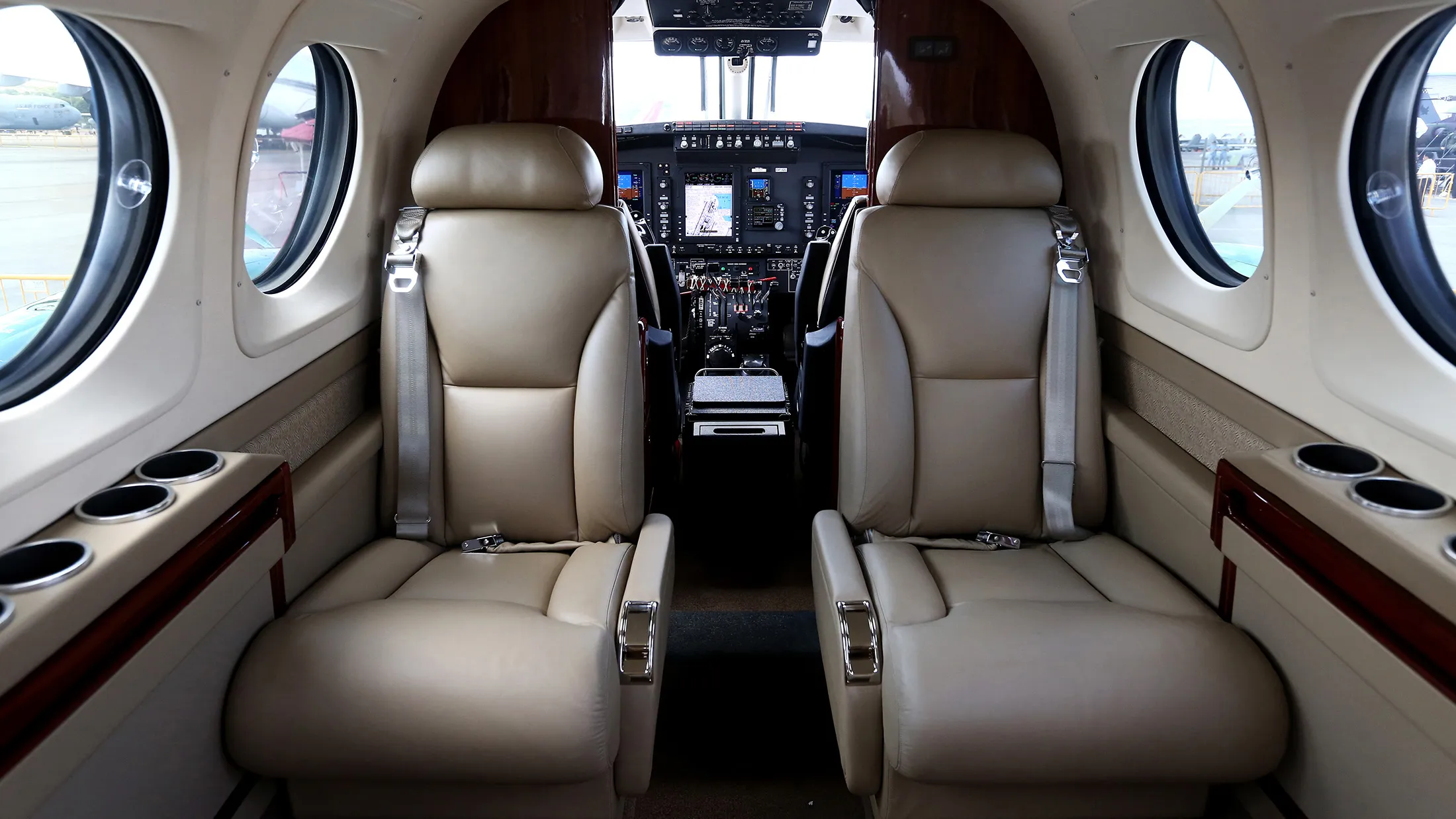 The flight deck and passenger seats of a Beechcraft King Air C90GTx aircraft manufactured by Textron Aviation Inc., a unit of Textron Inc., sit on display at the Singapore Airshow held at the Changi Exhibition Centre in Singapore, on Tuesday, Feb. 16, 2016. The air show runs through Feb. 21.

