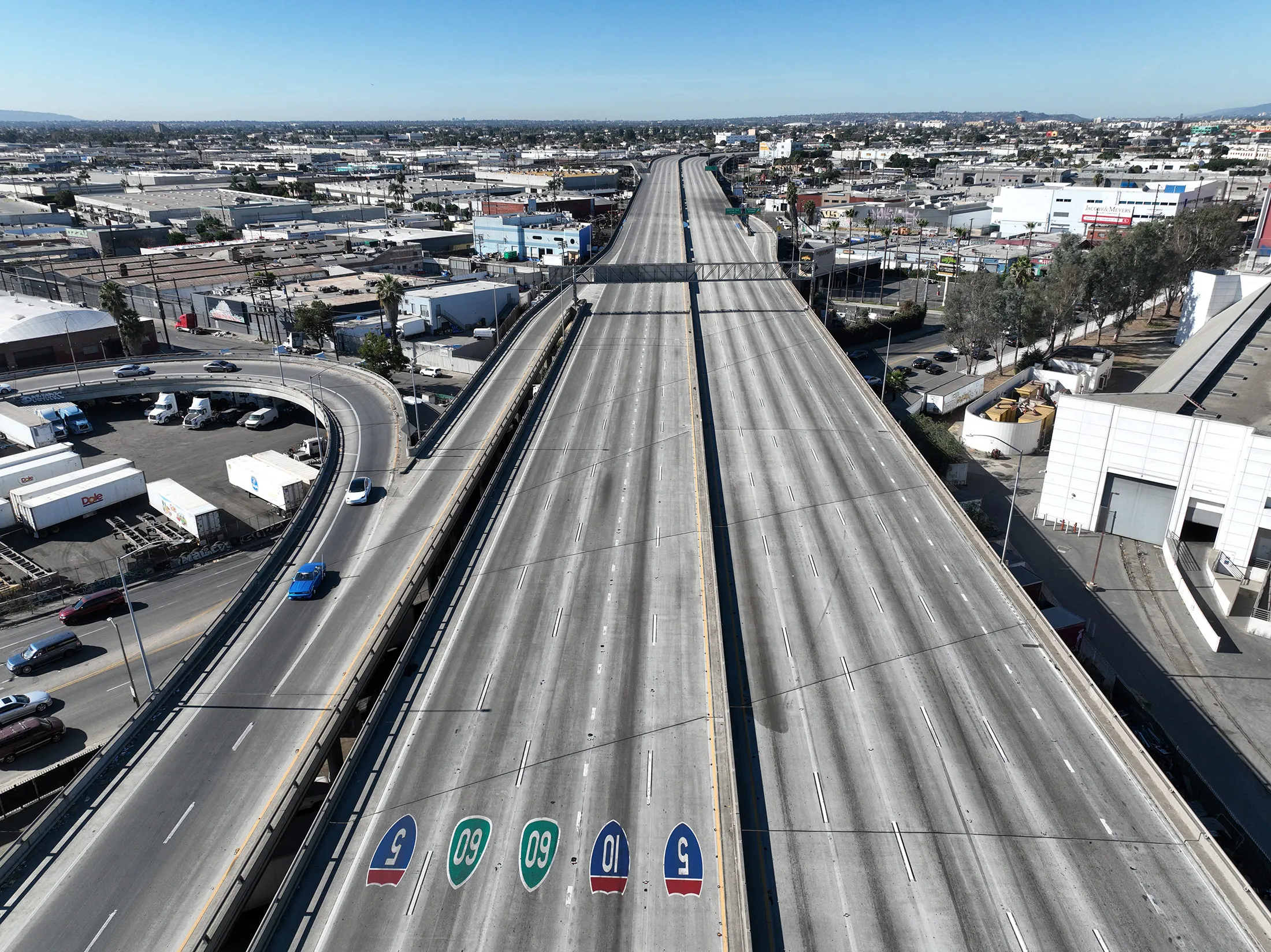 The Interstate 10 freeway a day after a large fire burned below, shutting the freeway to traffic, in Los Angeles, on Sunday, Nov. 12.