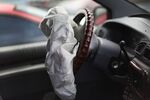 A deployed airbag is seen in a Chrysler vehicle at a salvage yard on May 22, 2015 in Medley, Florida.