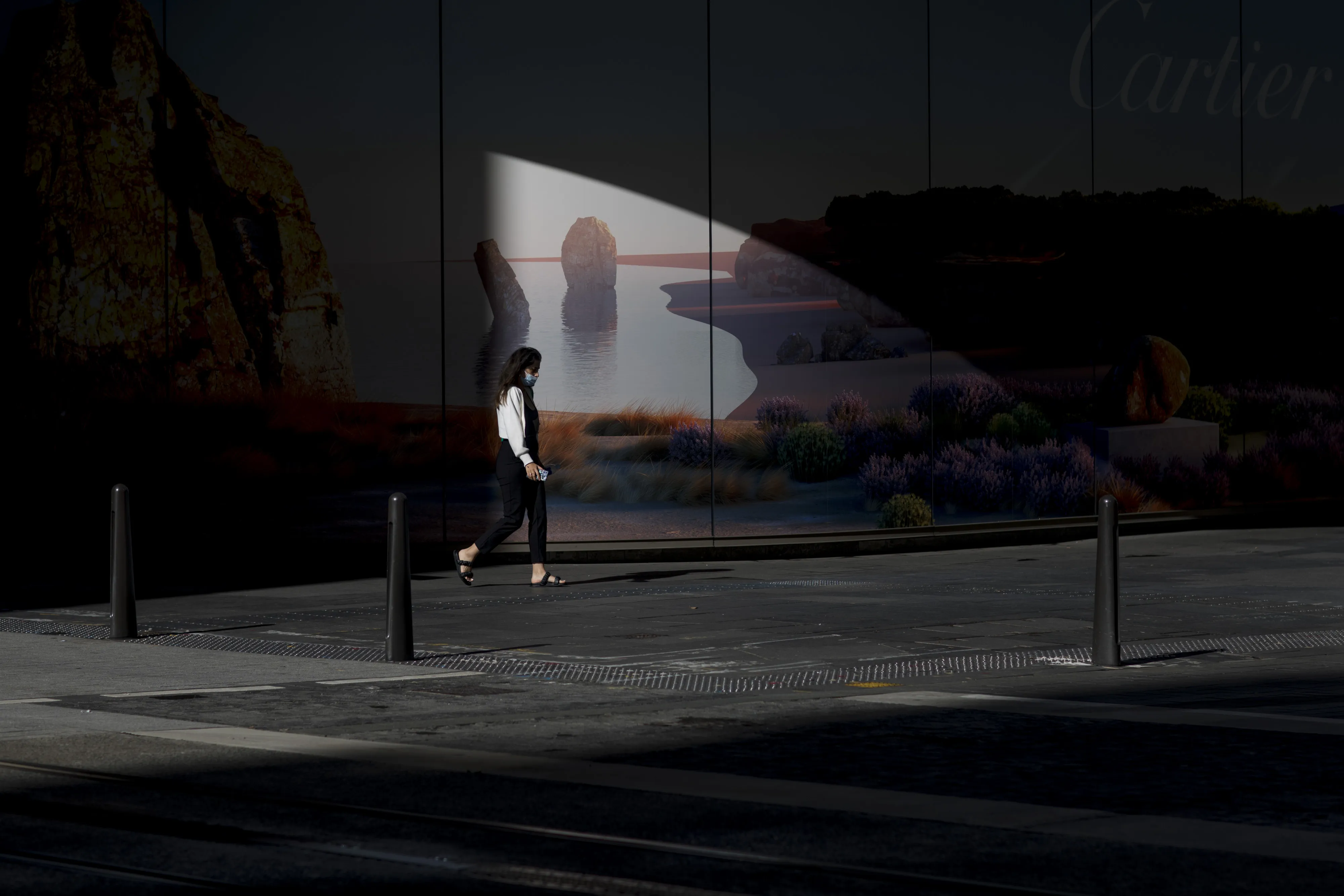 A pedestrian walks along a street in Sydney, on Dec. 29, 2021.