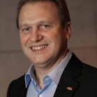 Headshot of Gilberto Tomazoni
