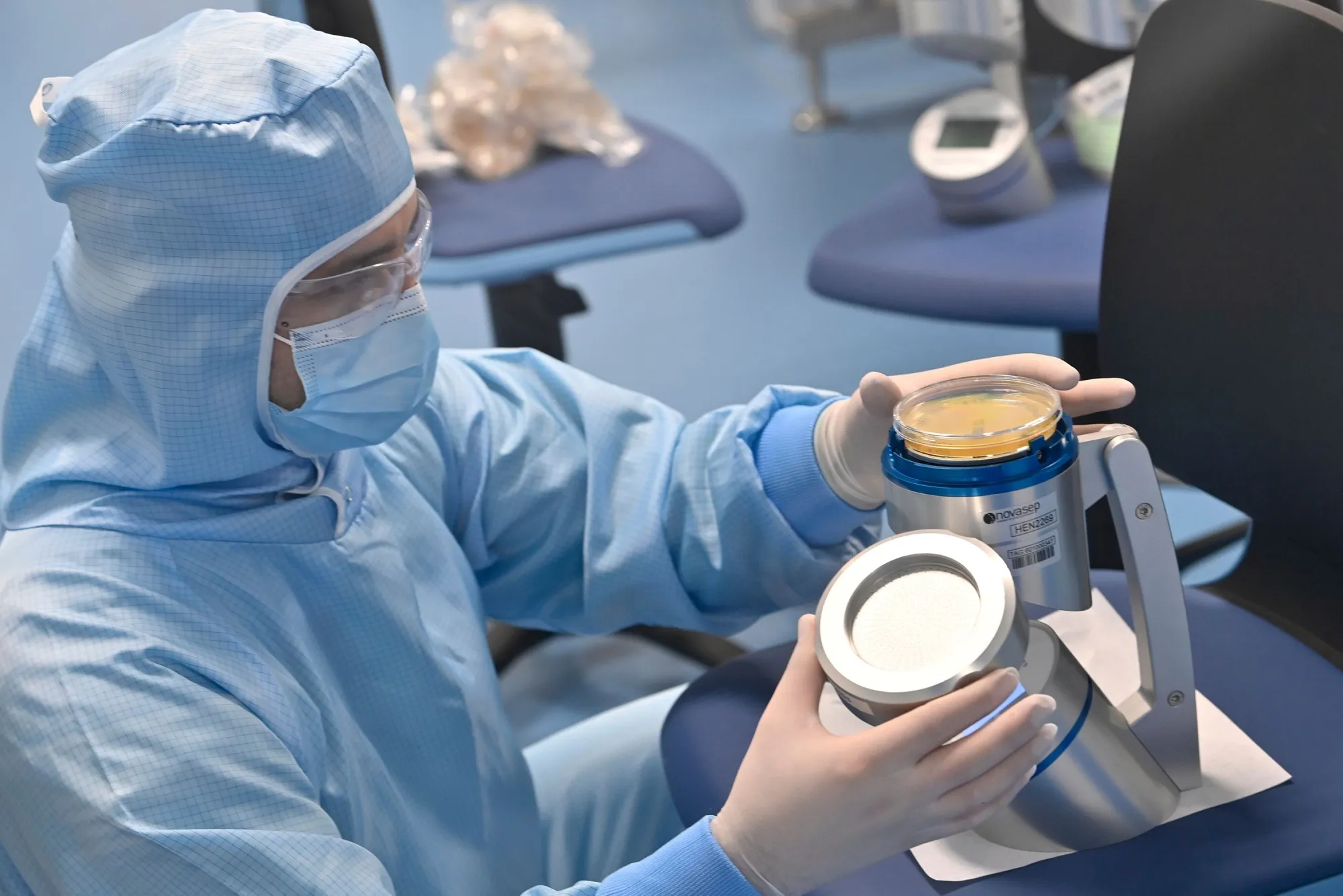 An employee performs an air quality test at the Thermo Fisher plant&nbsp;in Seneffe.&nbsp;