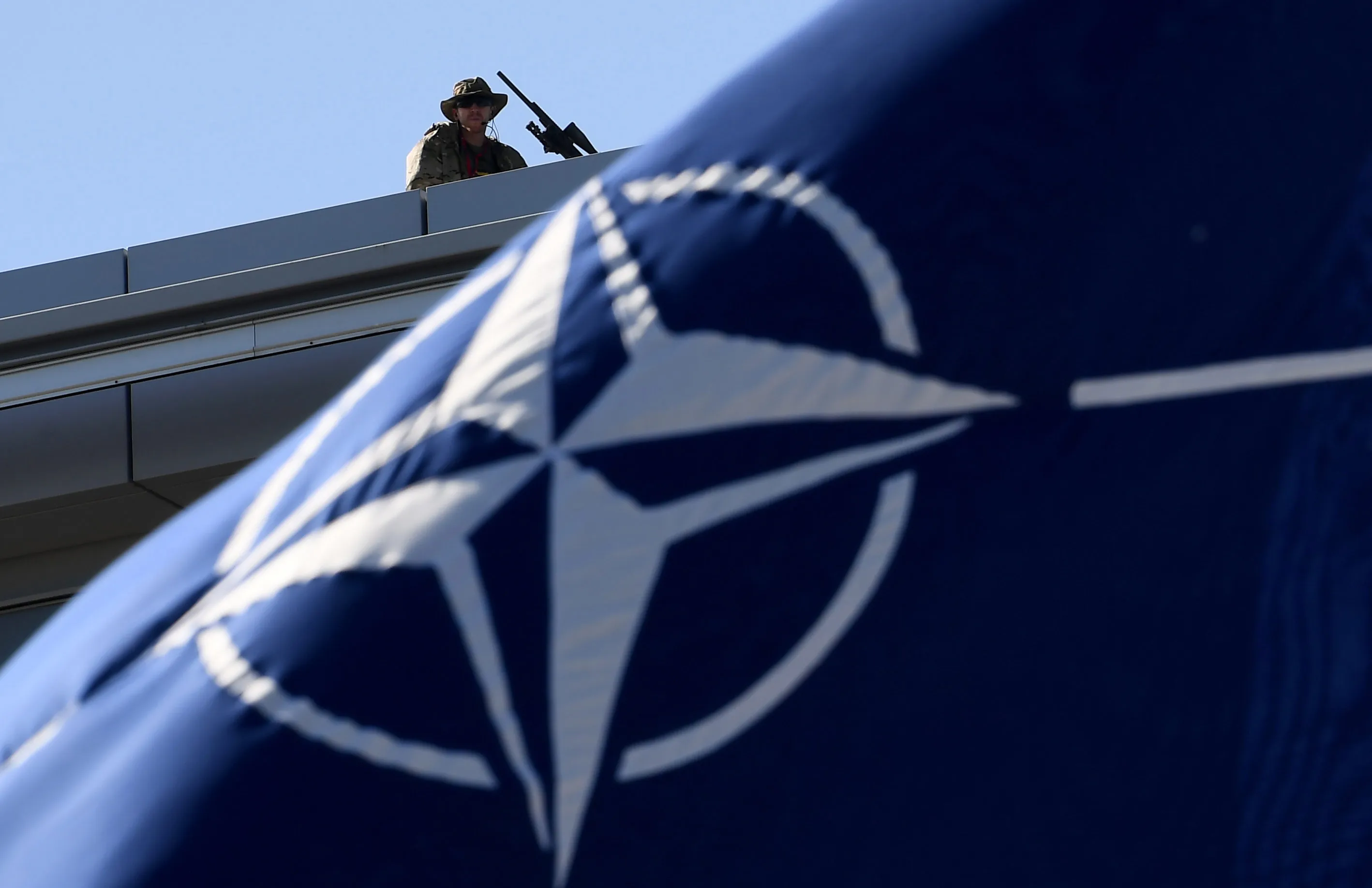 Security on top of the roof&nbsp;at the NATO headquarters&nbsp;in Brussels.