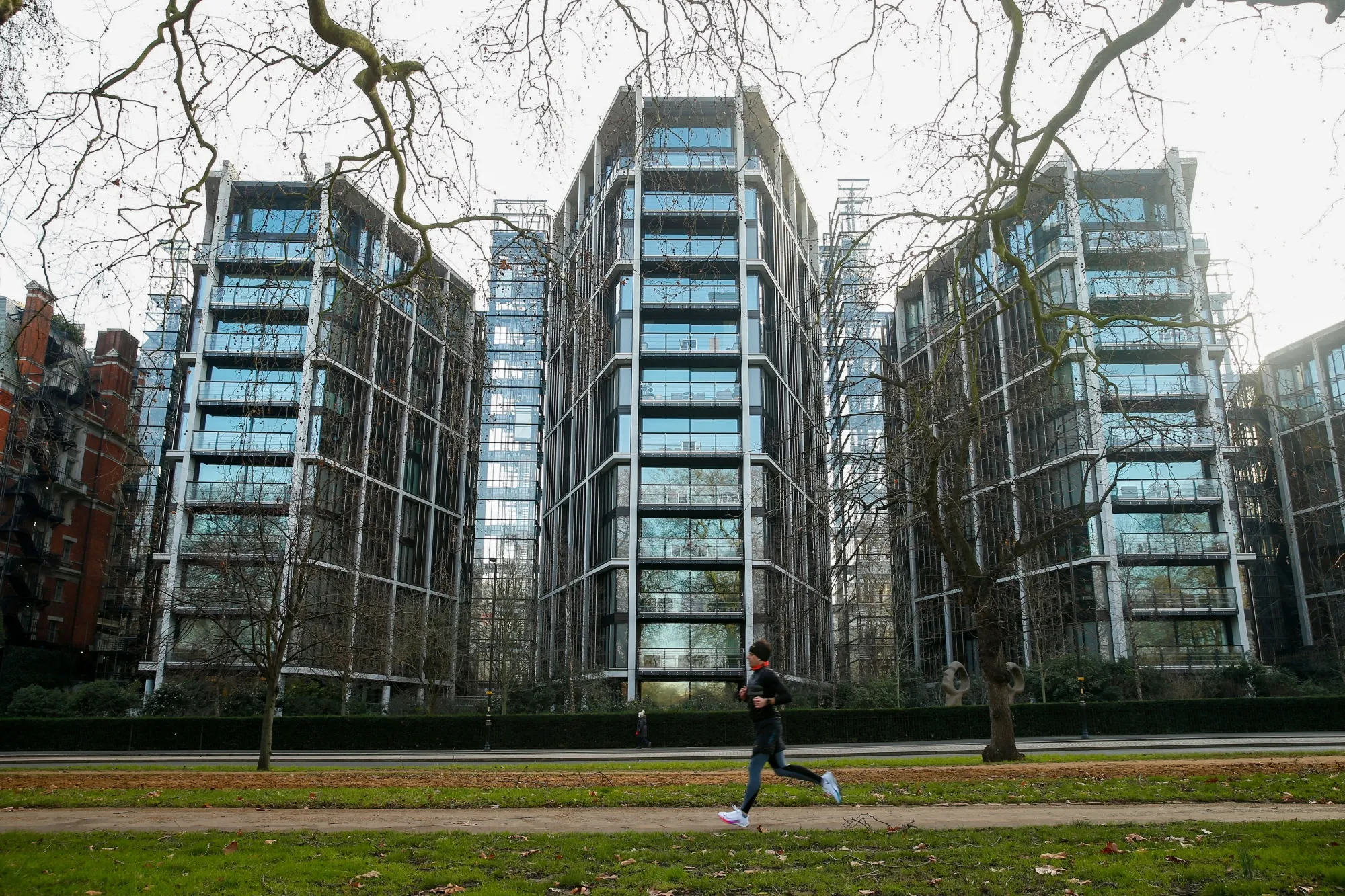 A jogger passes One Hyde Park in Knightsbridge, London.