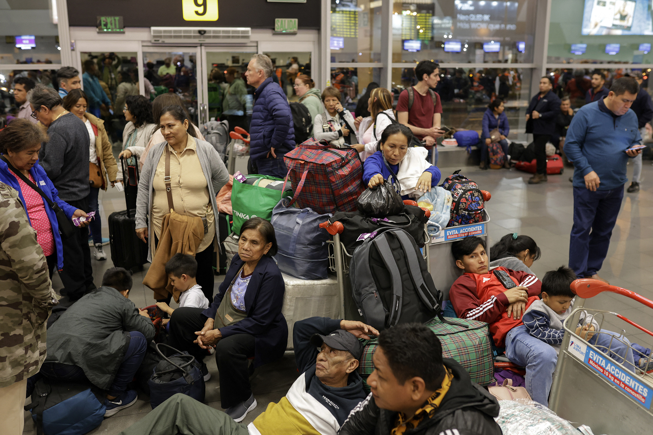 Travelers remain stranded at Peru’s main Jorge Chavez International Airport in Callao, a province adjacent to Lima, on June 3.