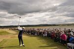 Tiger Woods of the US plays from the 12th tee during the first round of the British Open golf championship on the Old Course at St. Andrews, Scotland, Thursday, July 14, 2022. The Open Championship returns to the home of golf on July 14-17, 2022, to celebrate the 150th edition of the sport's oldest championship, which dates to 1860 and was first played at St. Andrews in 1873. (AP Photo/Gerald Herbert)
