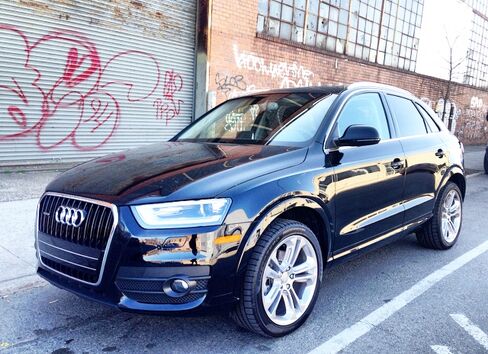 The Audi Q3 has smooth side lines and Audi's distinctive front grille.