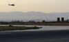 A picture taken during a press tour provided by the Russian Armed Forces on September 12, 2017 shows a Russian Kamov helicopter flies near S-300 missile system at the Hmeimim military base in Latakia province, in the northwest of Syria. / AFP PHOTO / Maria ANTONOVA (Photo credit should read MARIA ANTONOVA/AFP/Getty Images)
