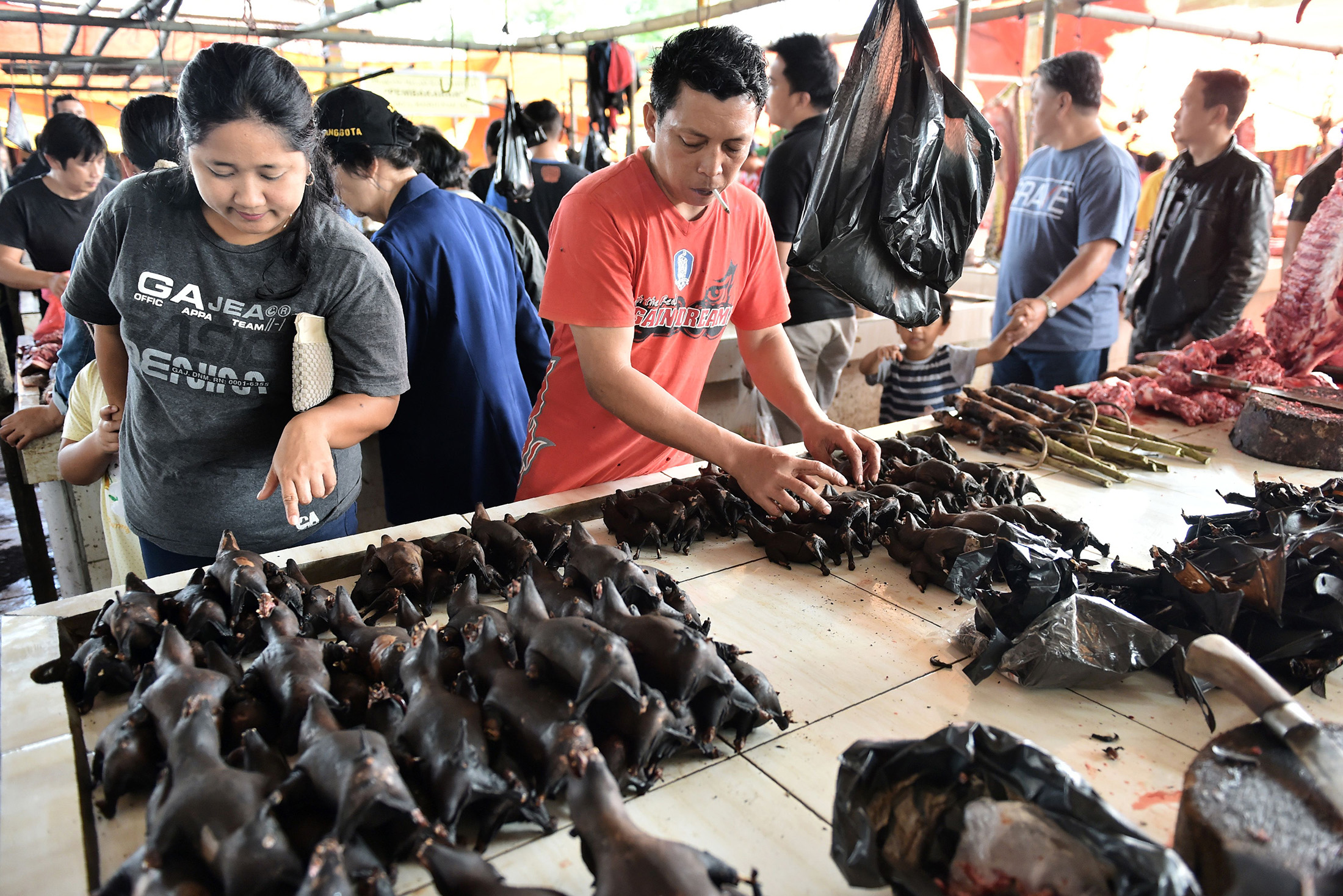 Bat meat is sold at a stall in Tomohon market in northern Sulawesi in 2017.