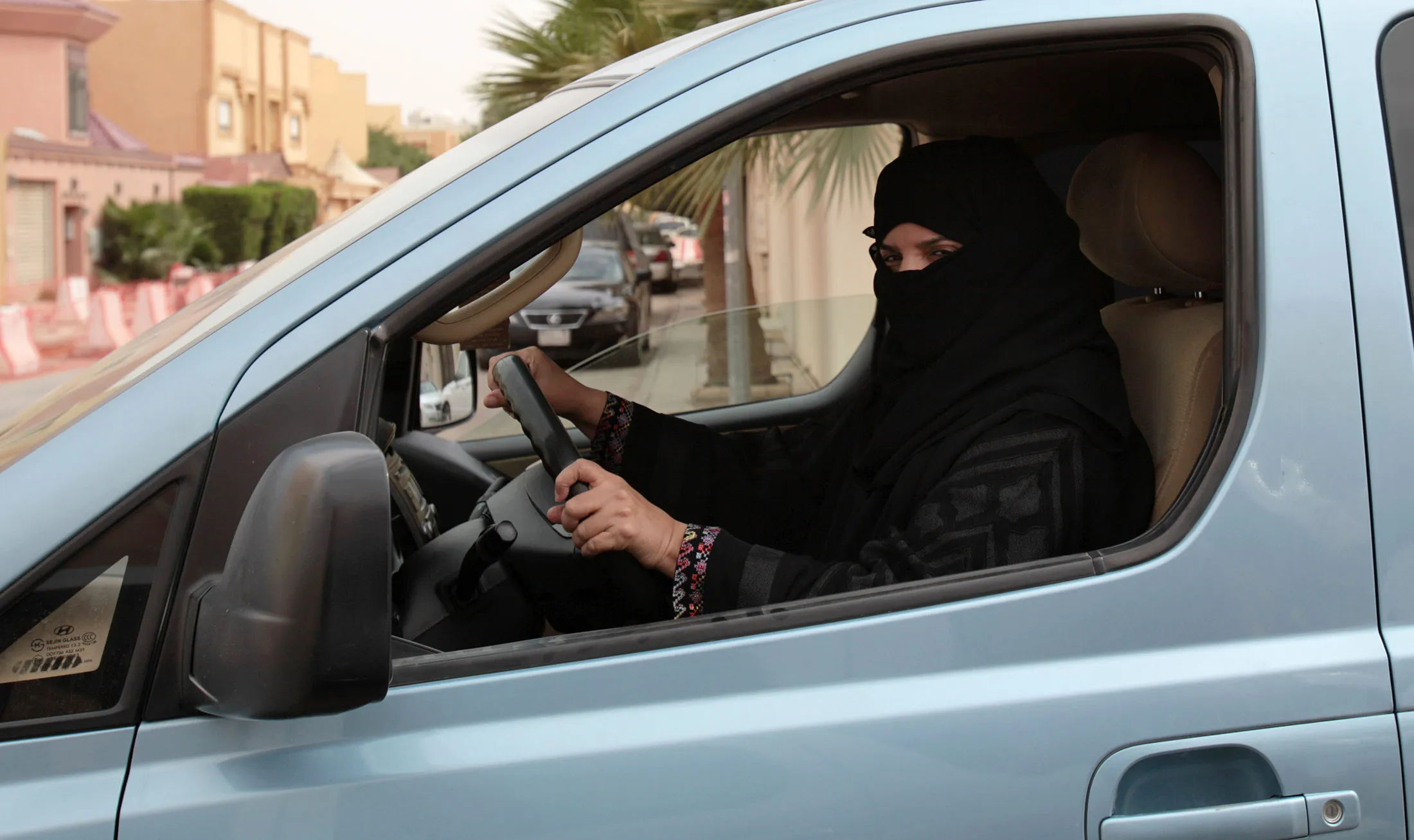 A woman drives a car in Riyadh, as part of a campaign to defy Saudi Arabia's ban,&nbsp;in March 2014.