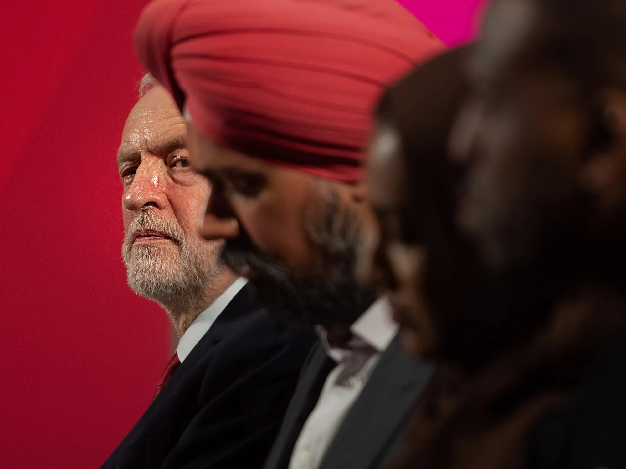 Jeremy Corbyn, left, attends the launch of the Labour Party manifesto on Nov. 26.