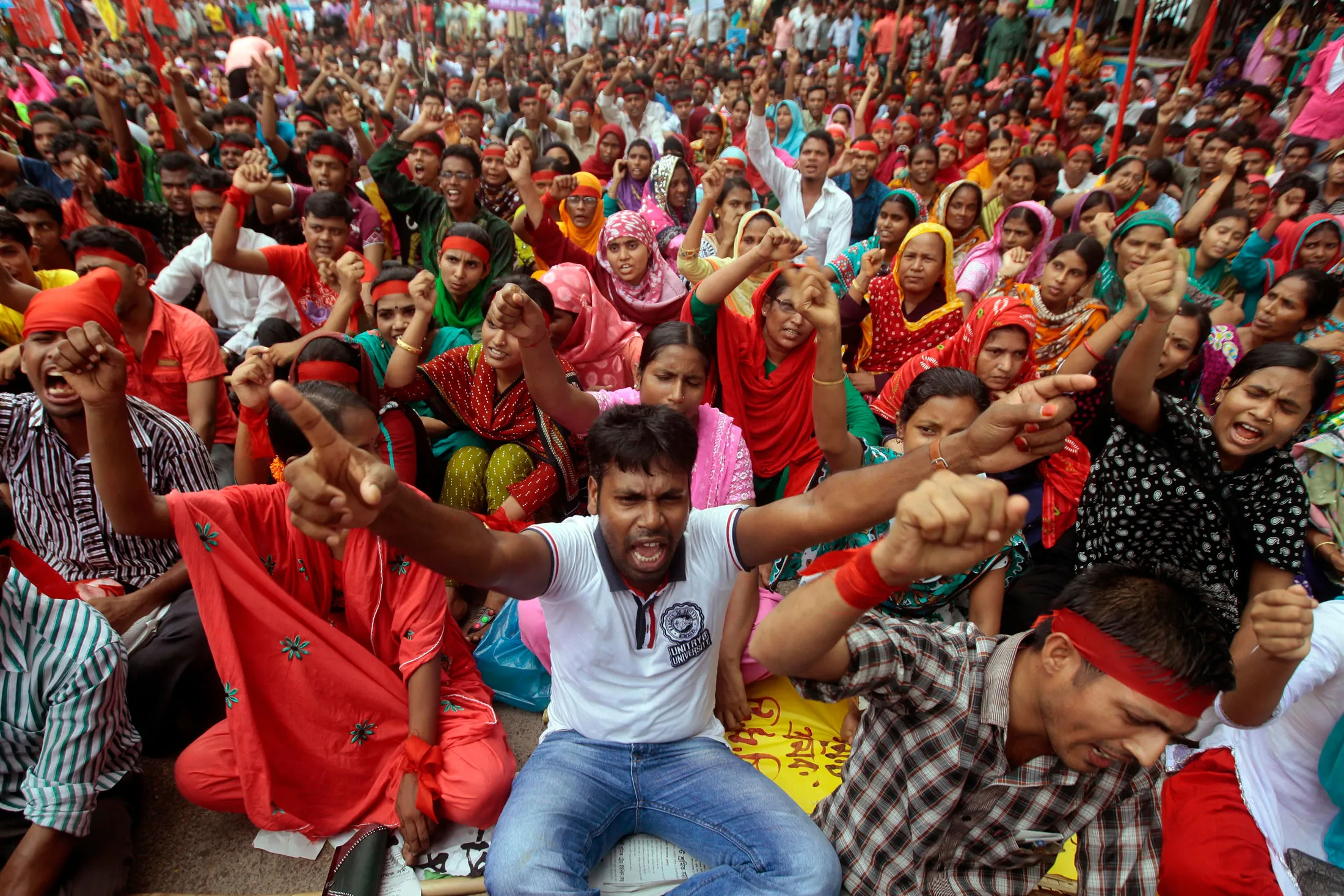 Garment workers in Dhaka in 2013 protesting for higher pay&nbsp;and compensation for the victims of the Rana Plaza disaster.&nbsp;