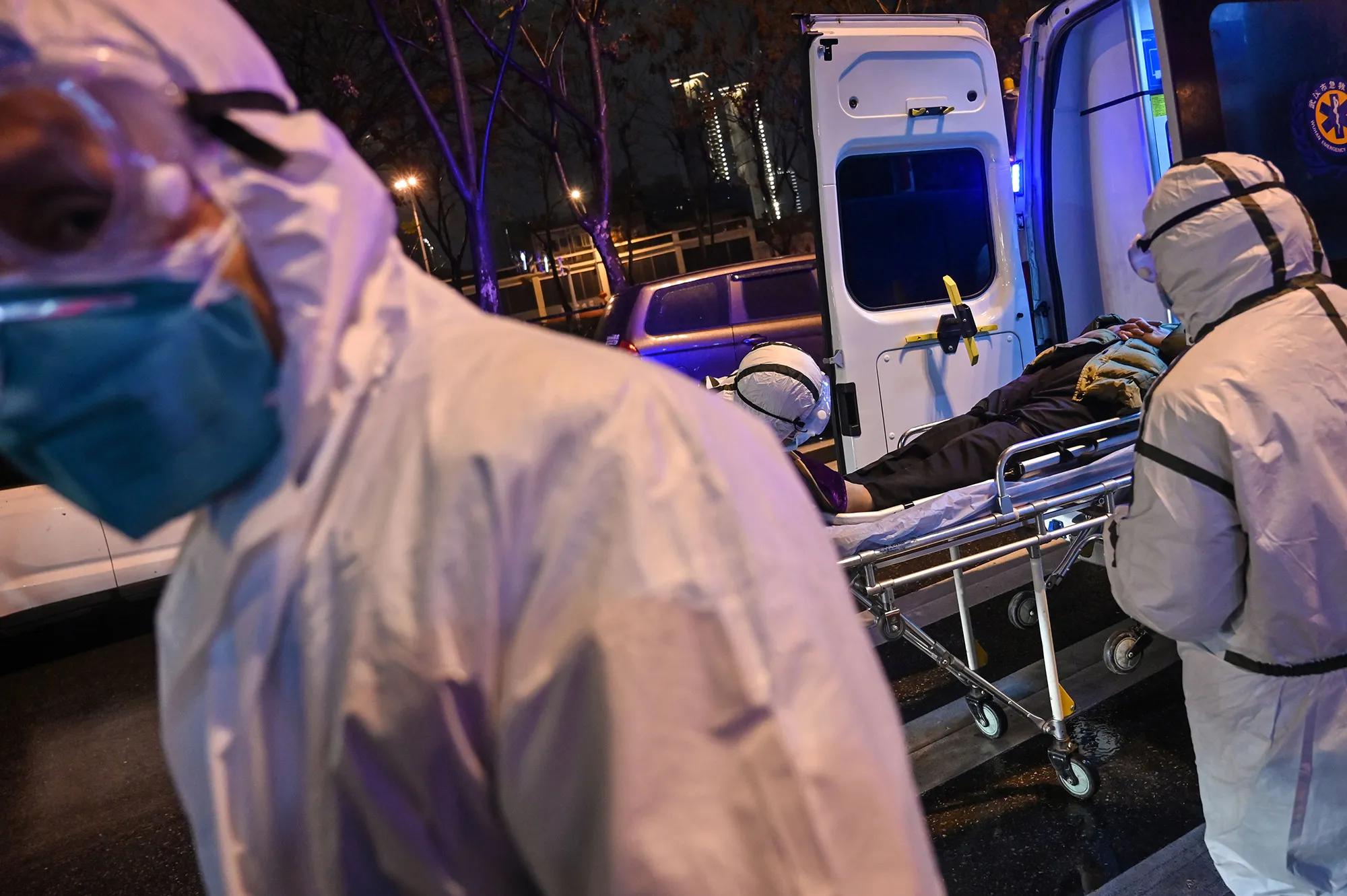 Medical staff wear protective clothing at the Wuhan Red Cross Hospital in Wuhan on Jan. 25.