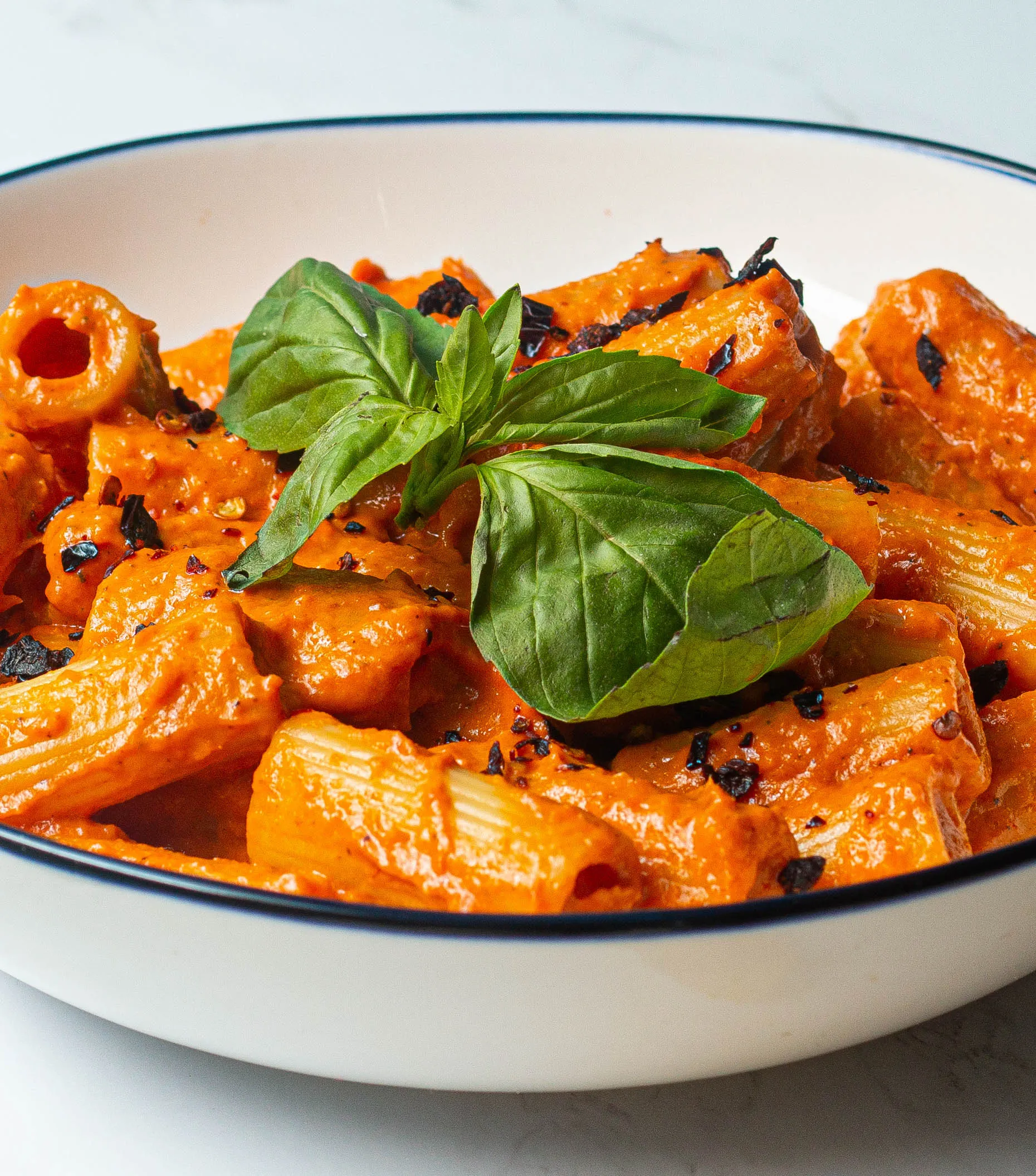 Creamy roasted red pepper pasta from Tasty UK’s Fiver Feast series.