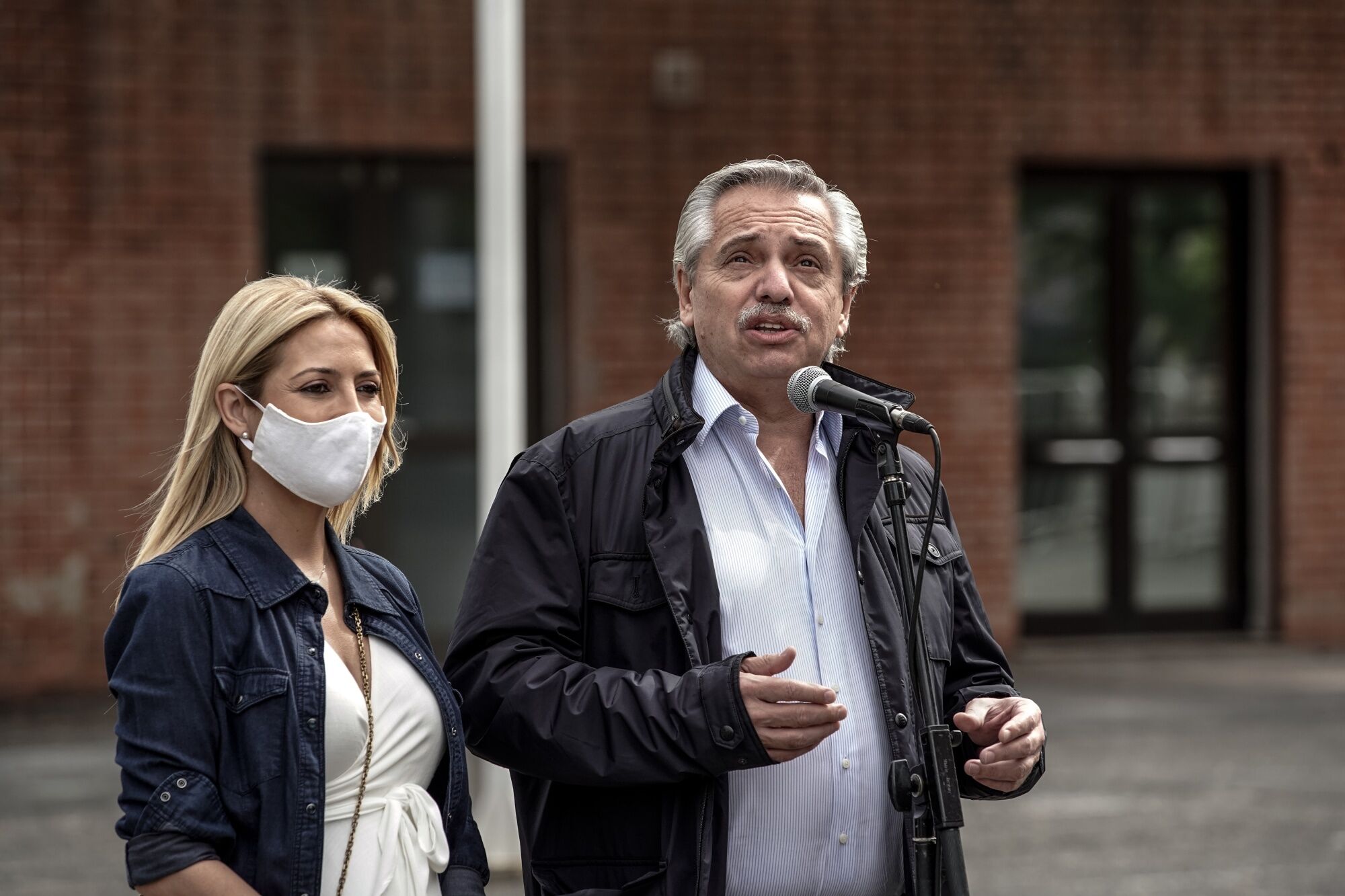 Alberto Fernandez speaks to members of the media after casting a ballot during the midterm elections in Buenos Aires on Nov. 14.