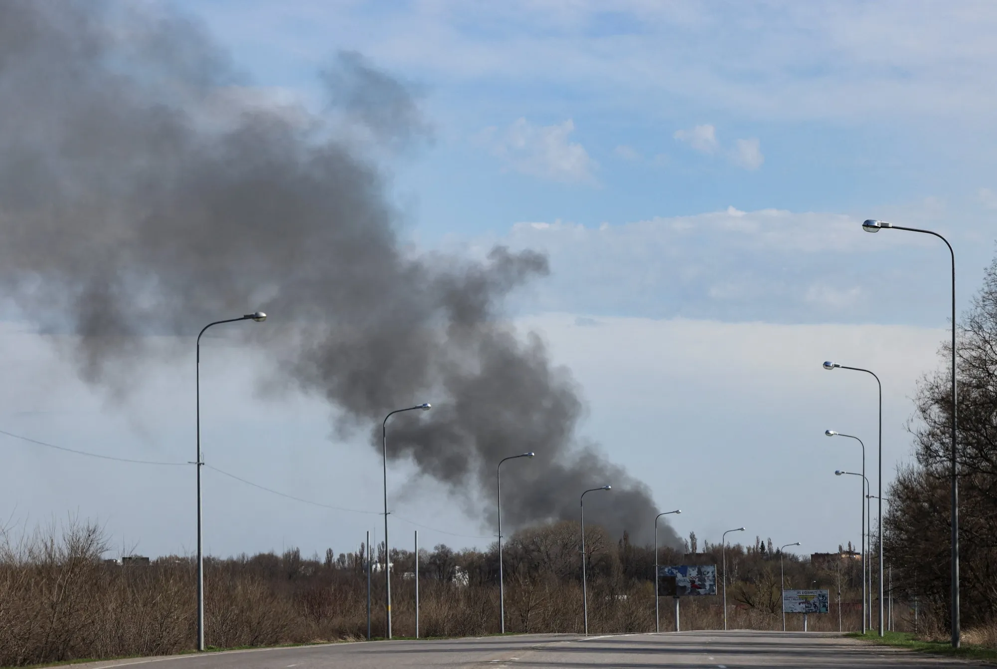 Smoke rises an airport following reported Russian missile attacks, in Dnipro, Ukraine, on April 10.