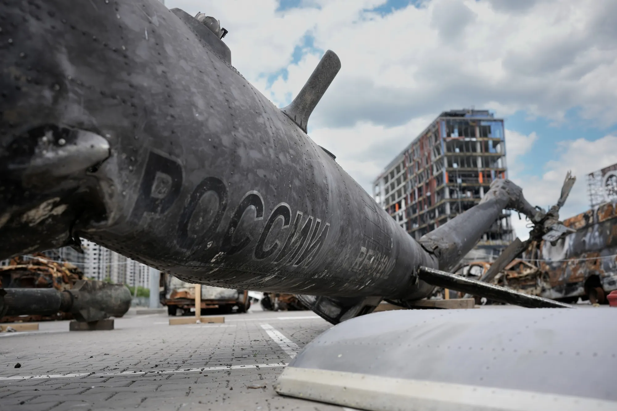 The remains of a Russian helicopter stored in the car park of the Retroville shopping center in Kyiv.
