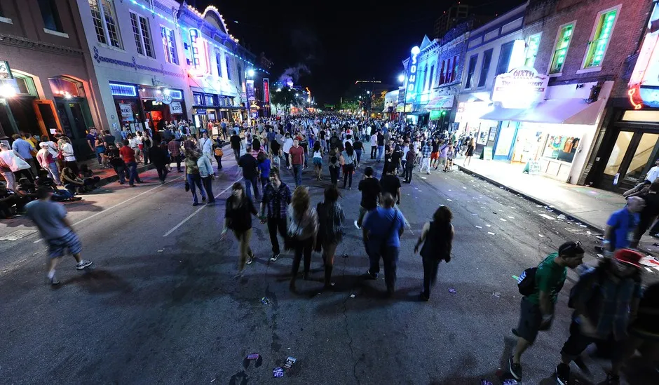 Businesses along Sixth Street in Austin benefit from the swell of foot traffic during SXSW.