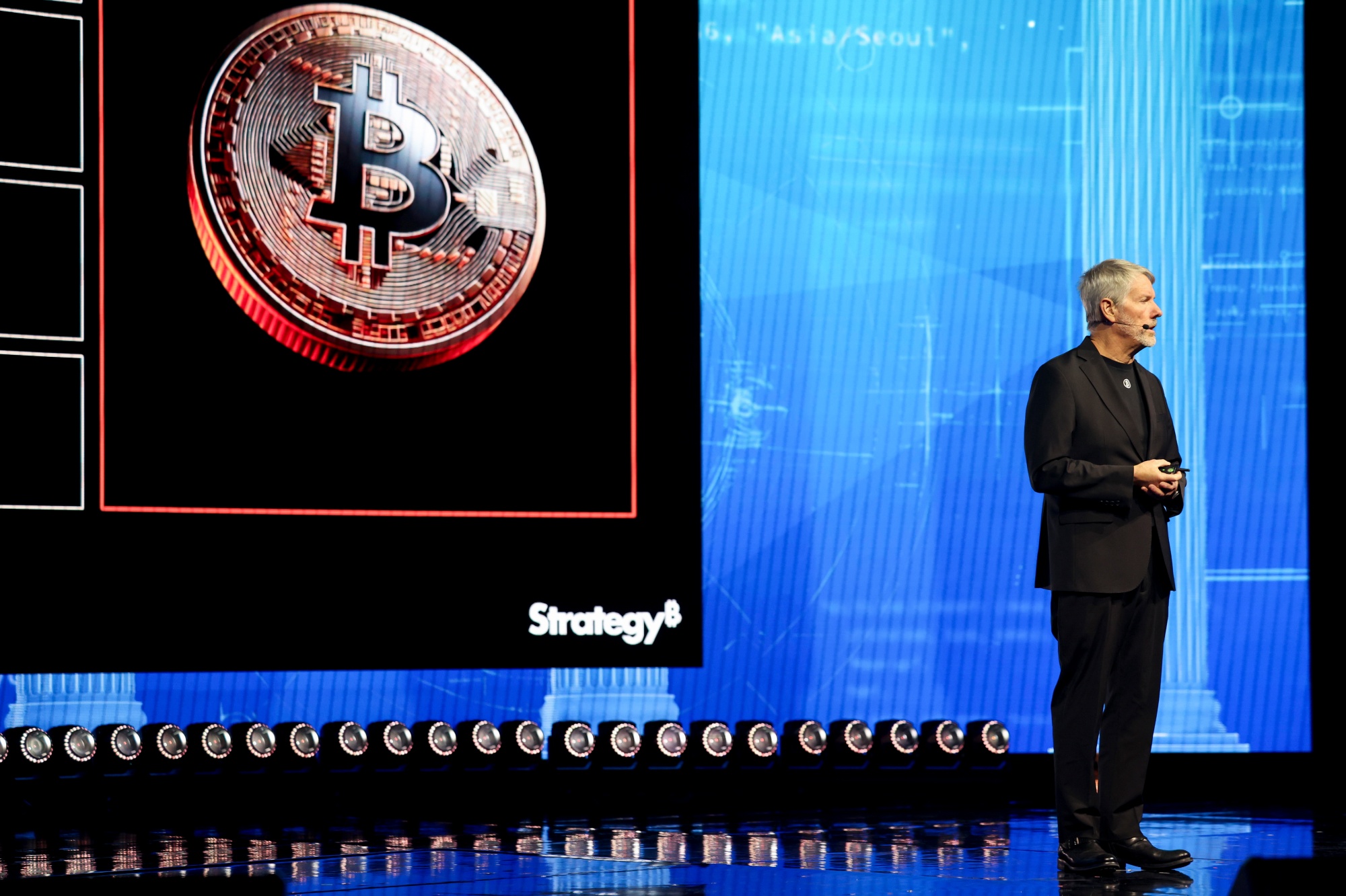 Michael Saylor, co-founder and executive chairman of Strategy Inc., speaks during the Bitcoin 2026 conference in Las Vegas, Nevada, US, on Tuesday, April 28, 2026. The event will examine the future of money as Bitcoin enters a new era of institutional adoption and regulatory clarity.