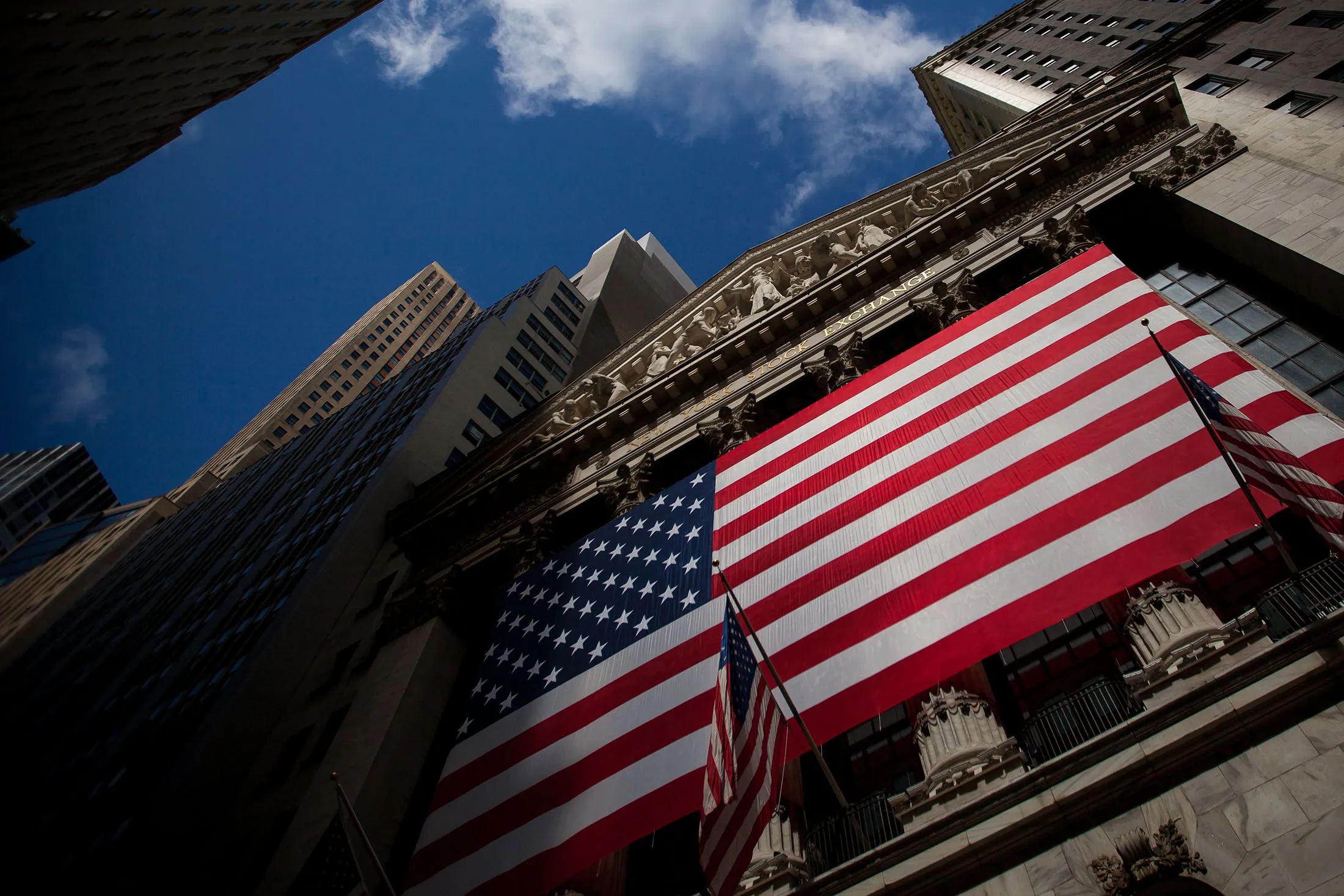 An American flag is displayed on the exterior of the New York Stock Exchange (NYSE) in New York on May 26, 2017.
