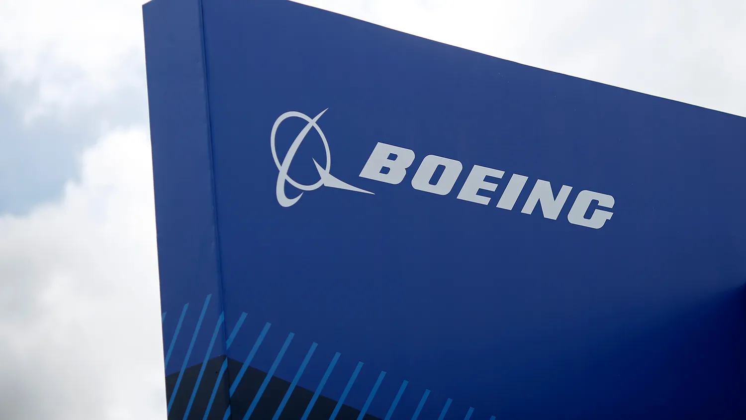 A Boeing logo sits on the Boeing Co. company's chalet prior to the opening of the Farnborough International Airshow in Farnborough, U.K., on Sunday, July 13, 2014.
