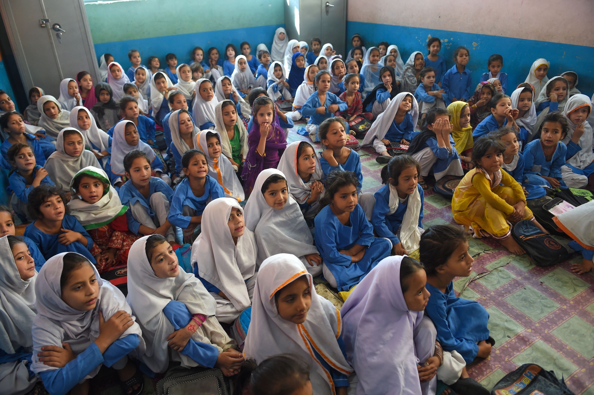 Pakistani girls attend class on September 18, 2018.