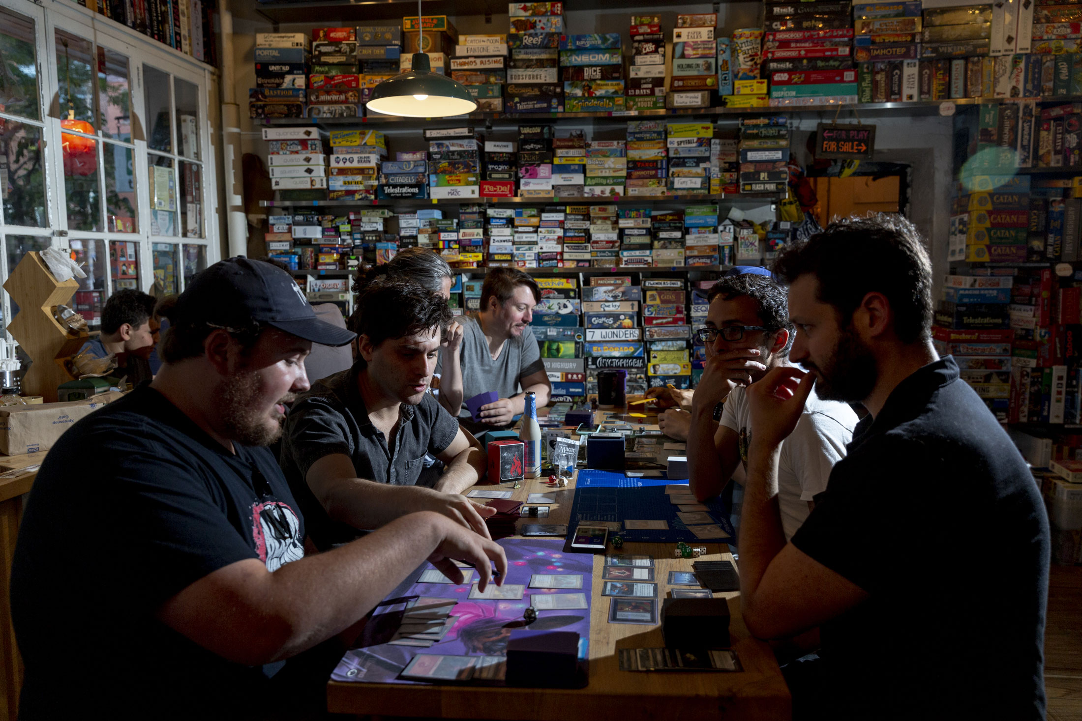 Participants play Magic: The Gathering card game in New York.