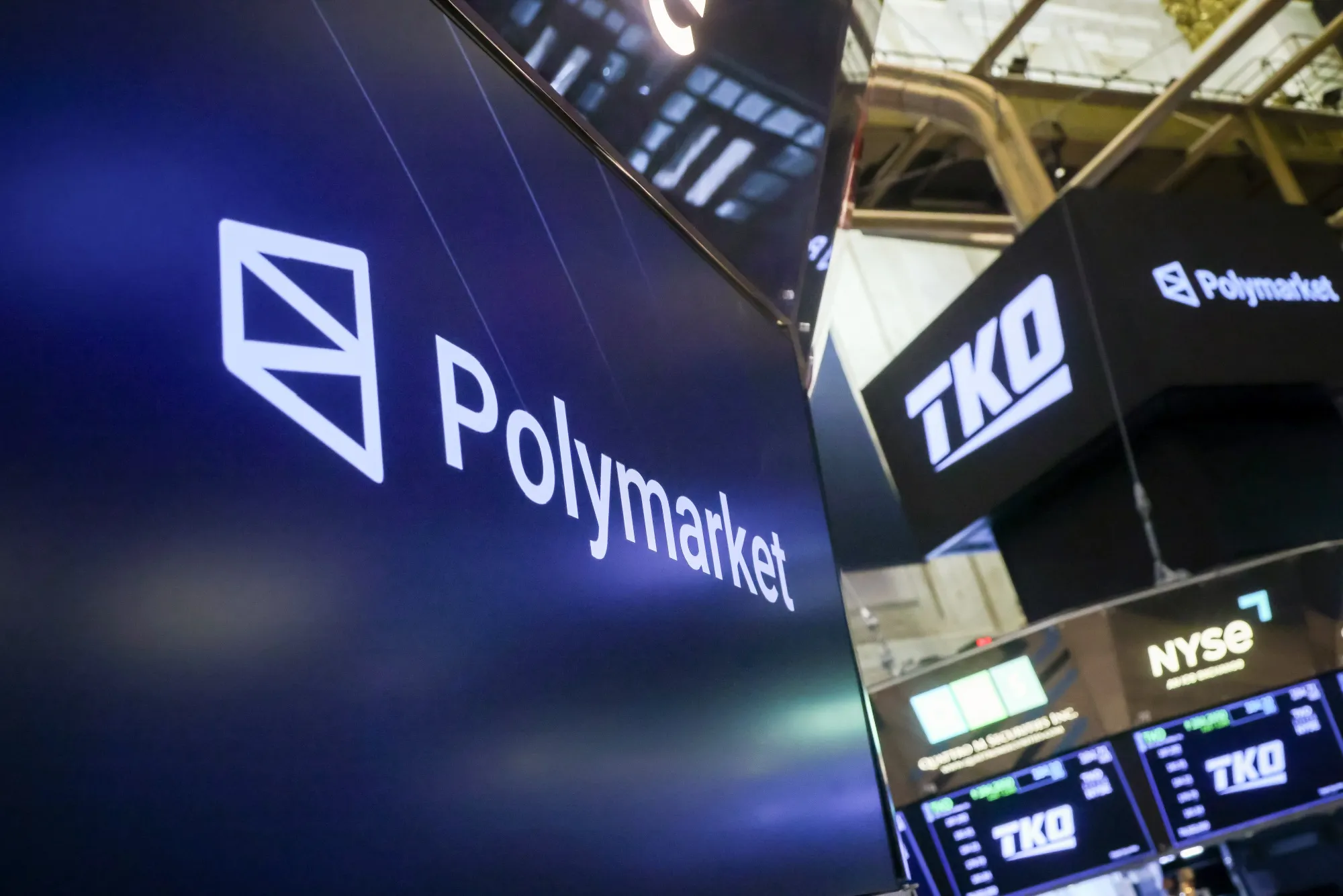 Polymarket signage on the floor of the New York Stock Exchange on Nov. 13.&nbsp;