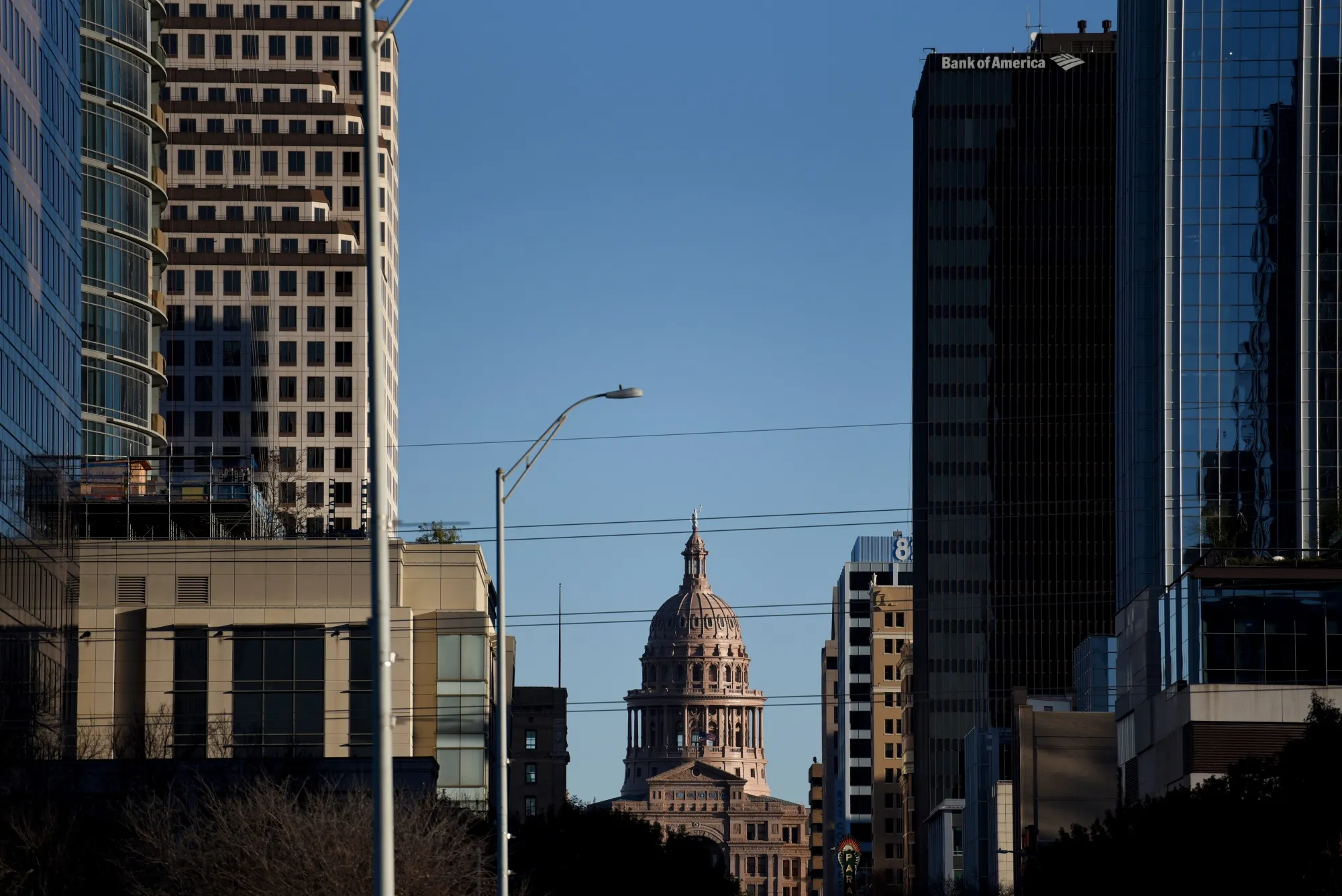 The Texas State Capitol building, center, stands in downtown Austin, Texas.