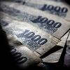 BERLIN, GERMANY - JULY 02: In this Photo Illustration japanese Yen bank notes, official currency of Japan, lie on a table on August 02, 2016, in Berlin, Germany. (Photo Illustration by Thomas Trutschel/Photothek via Getty Images)