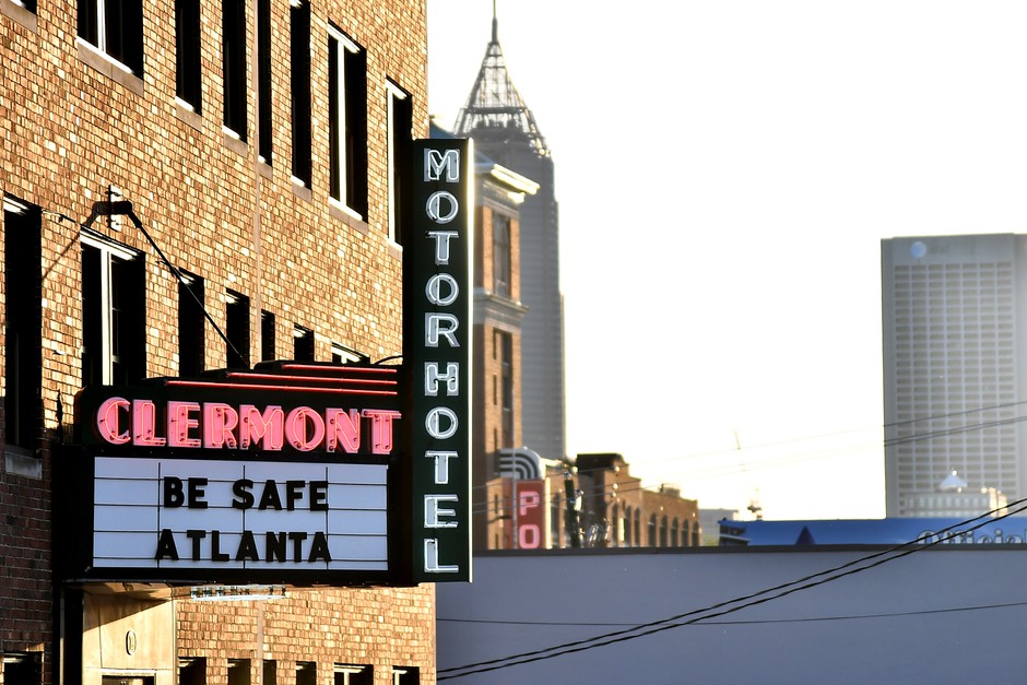 The Clermont Hotel's marquee displays &quot;Be Safe Atlanta.&quot; Georgia Governor Brian Kemp has promised to reopen many businesses, despite warnings from public health experts.