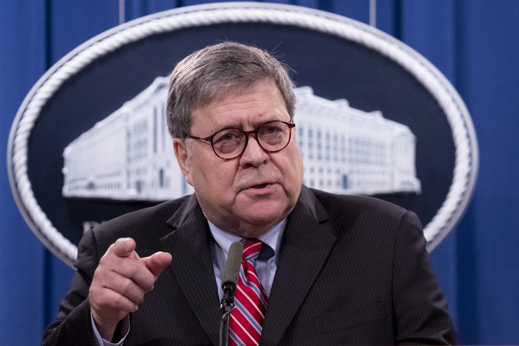 William Barr during a news conference at the U.S. Department of Justice on Dec. 21.