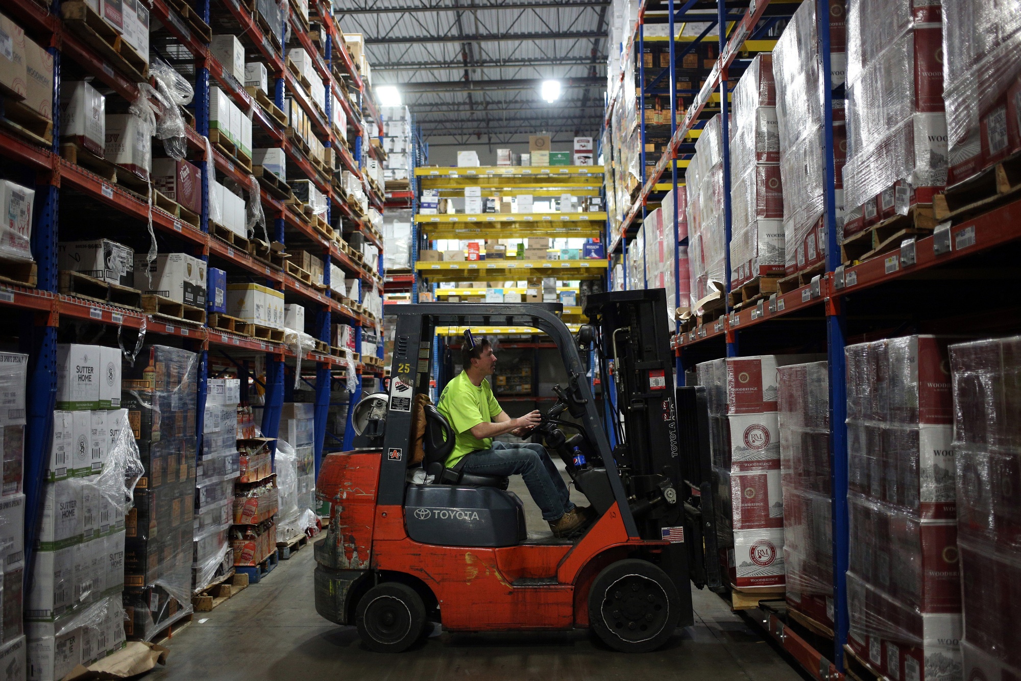 A worker uses a forklift in the distribution warehouse in Louisville, Kentucky.