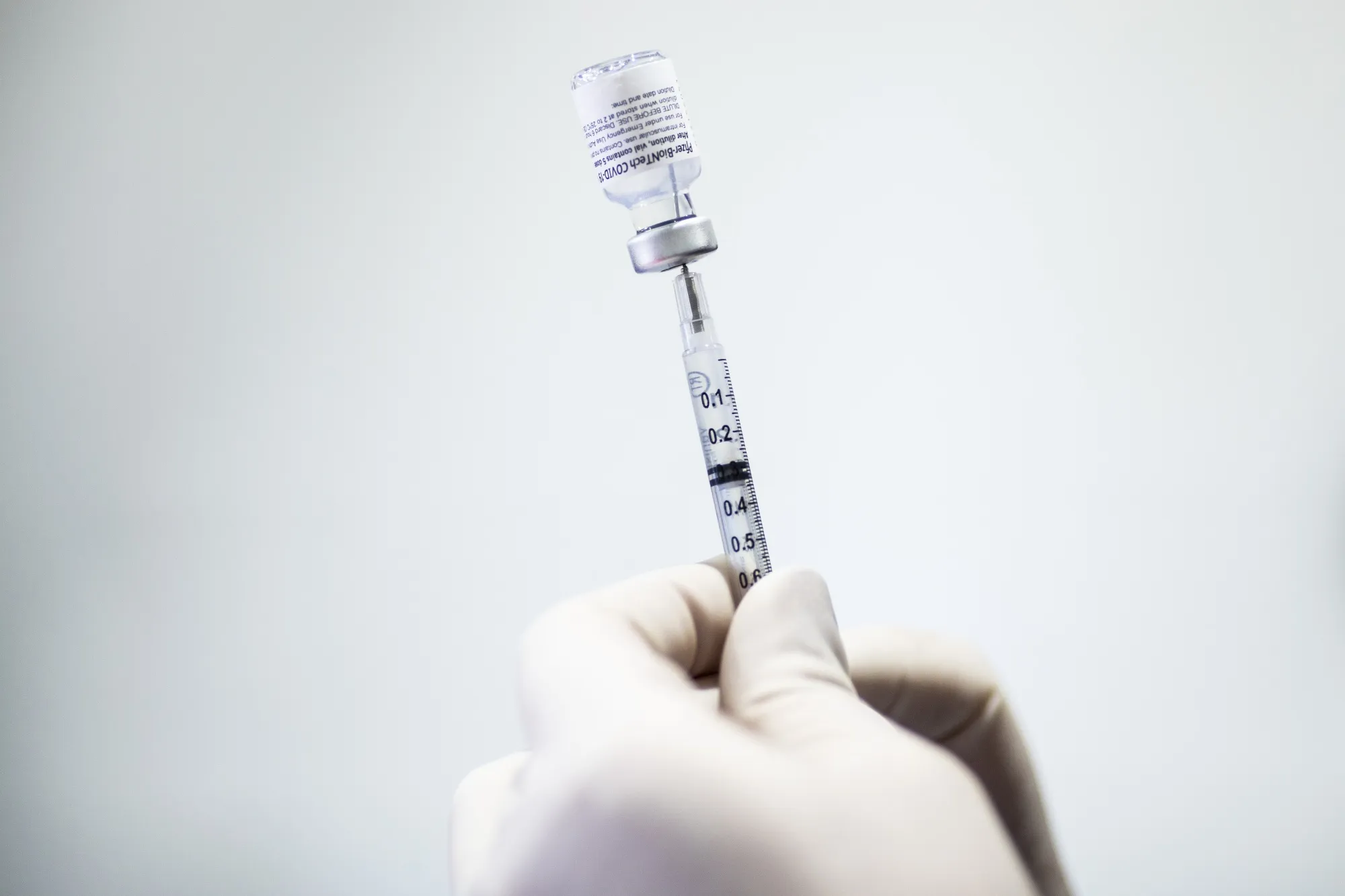 Residents Receive Covid-19 Vaccinations At Coors Field