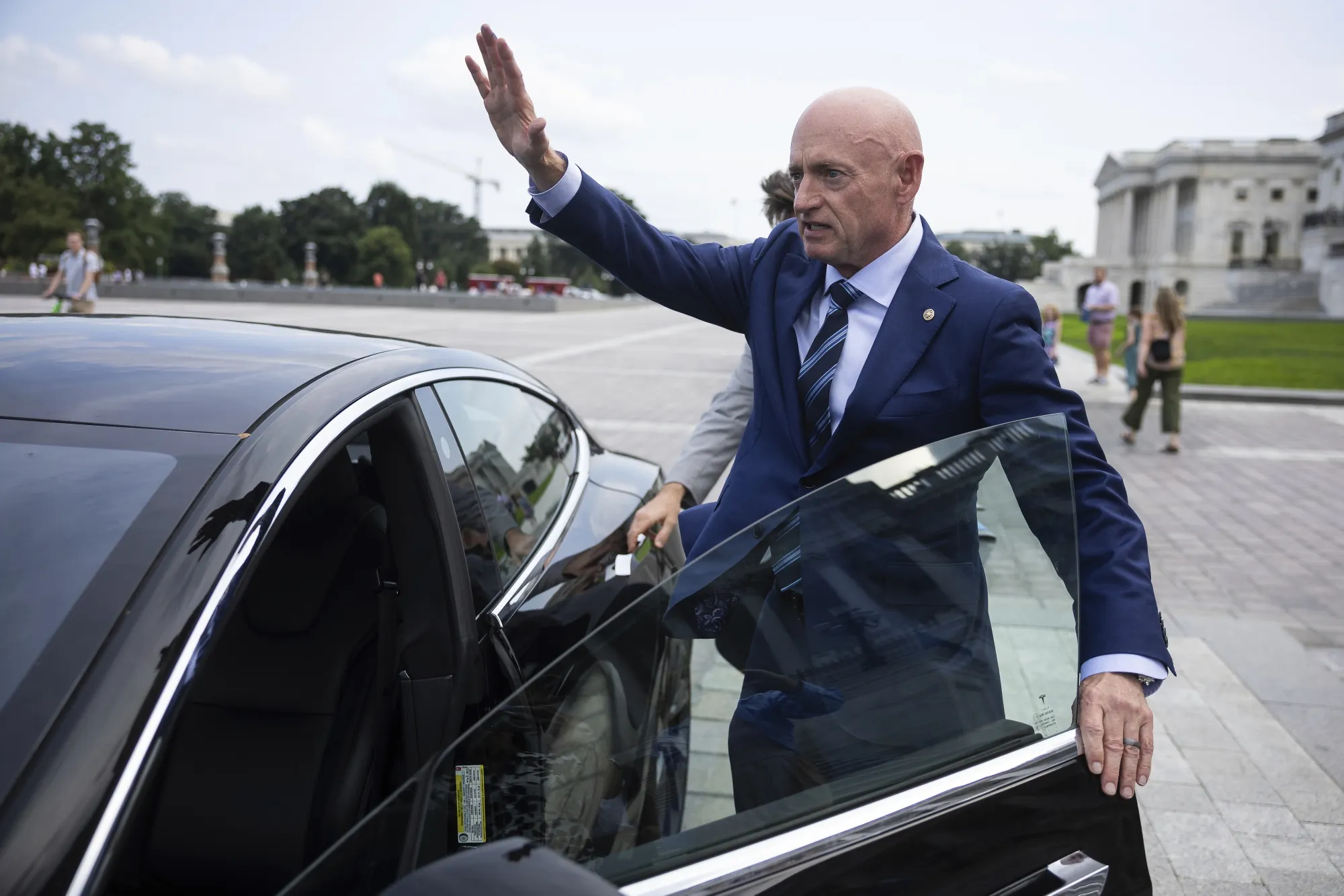 テスラ通勤「これが最後」と米議員－マスク氏のDOGE広告塔と批判