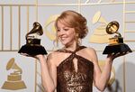 Maria Schneider poses with her trophies in 2016.