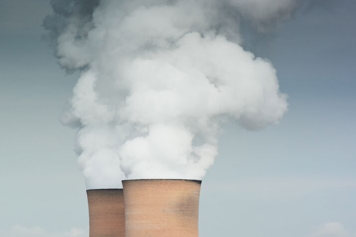 Vapor Rises From Cooling Towers