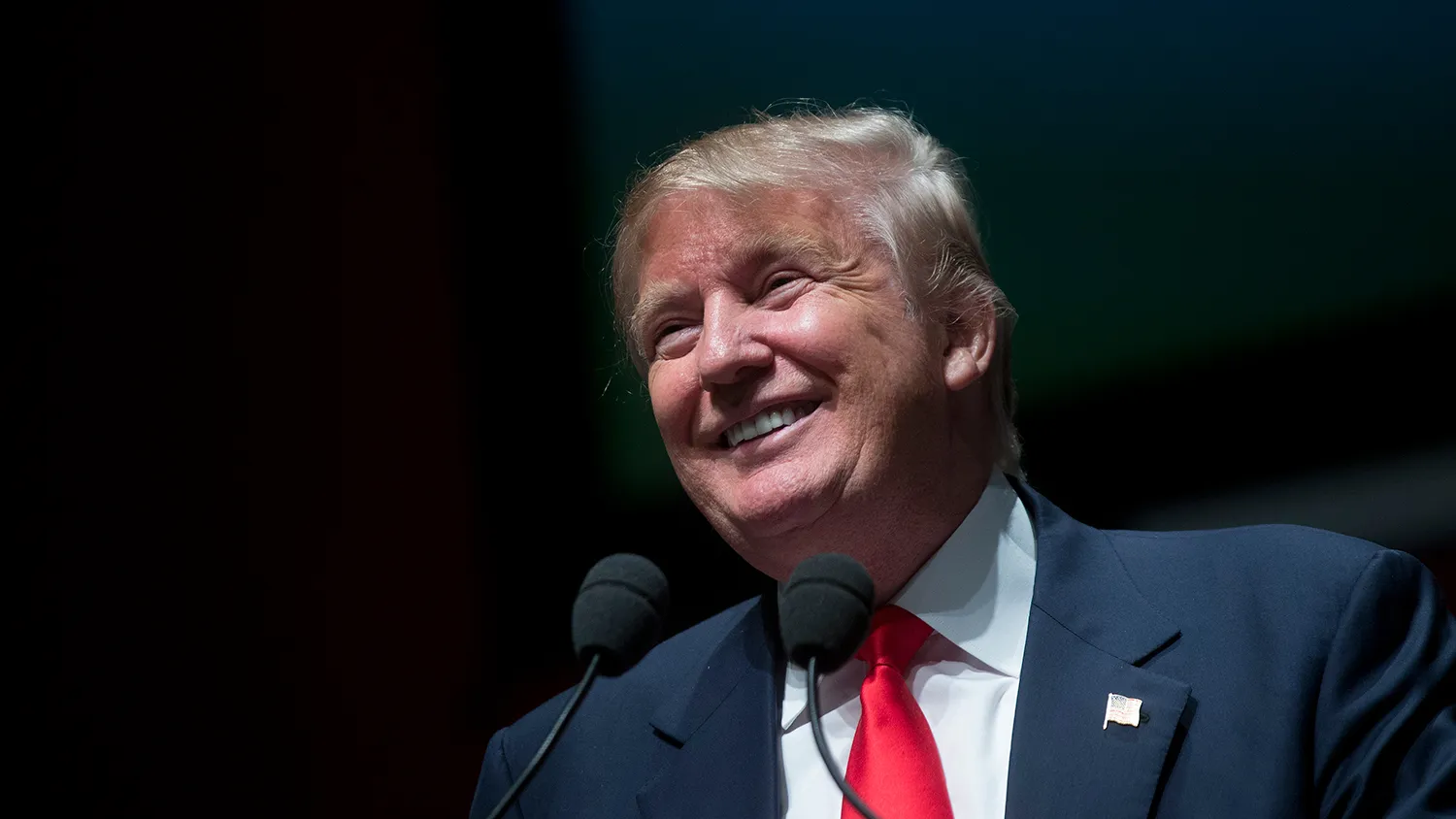 Donald Trump, president and chief executive of Trump Organization Inc., smiles as he arrives to speak during the South Carolina Freedom Summit hosted by Citizens United and Congressman Jeff Duncan in Greenville, South Carolina, U.S., on Saturday, May 9, 2015.
