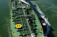 Views Of Tankers & Refineries As Oil Trades Near 12-Year Low