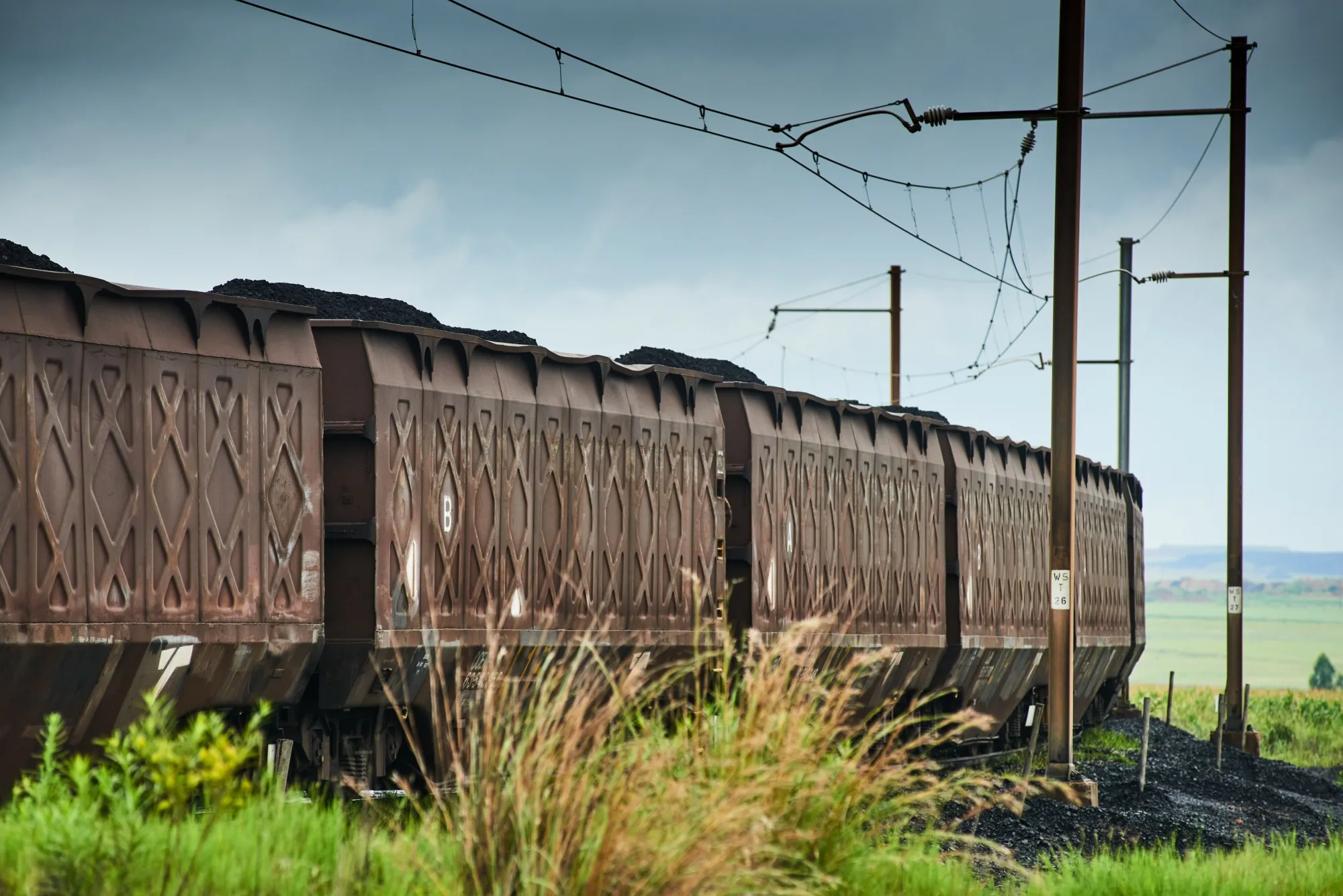 Coal on rail transit in Middelburg, South Africa.