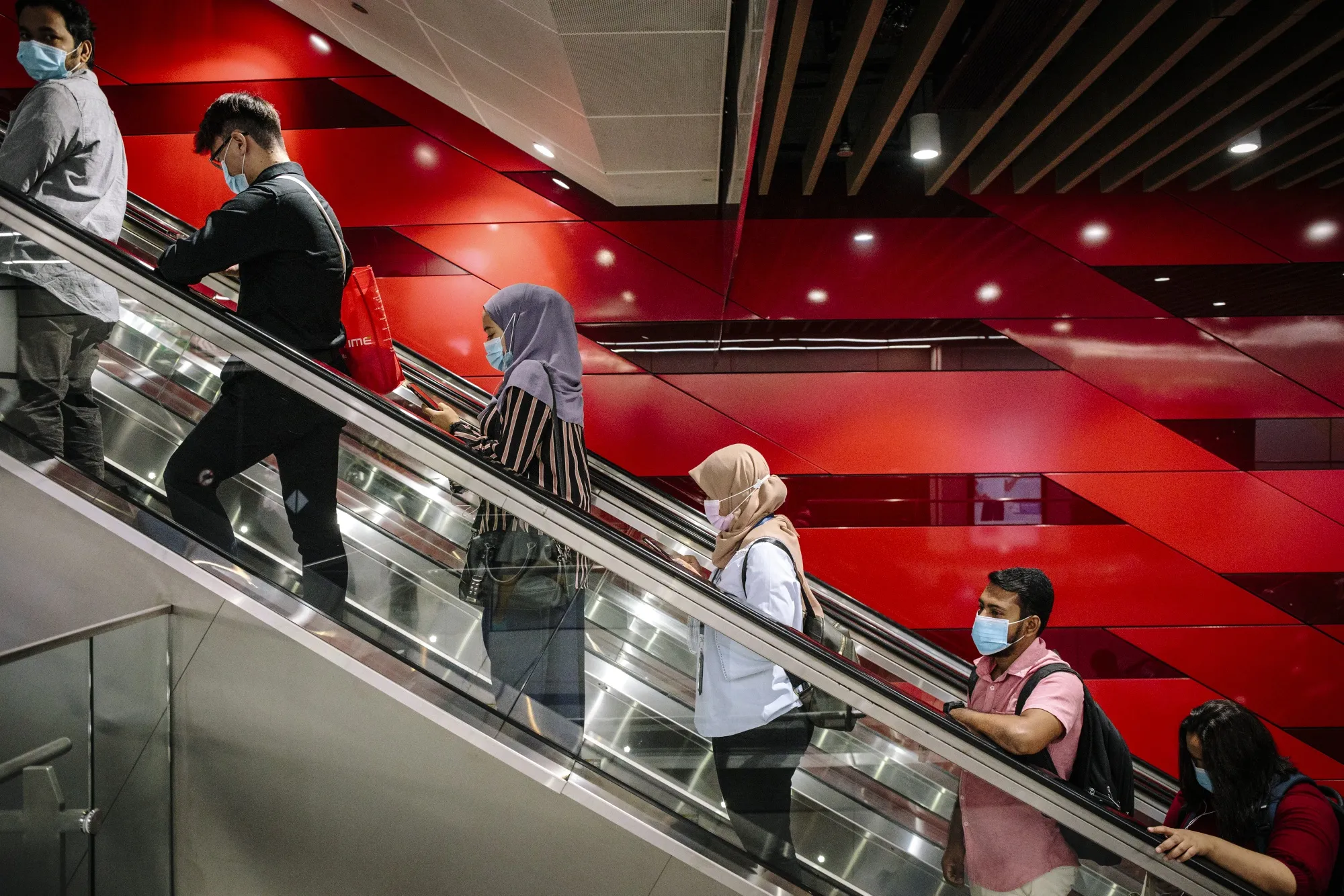 Commuters on an escalator at an MRT&nbsp;station in Kuala Lumpur, Malaysia.&nbsp;
