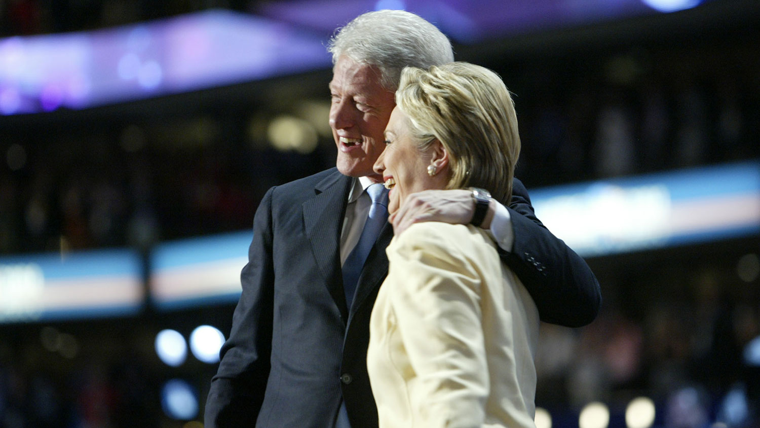 Former President Bill Clinton and Senator Hillary Clinton embrace after the senator introduced her husband to the first session of the Democratic National Convention in Boston Monday July 26, 2004.
