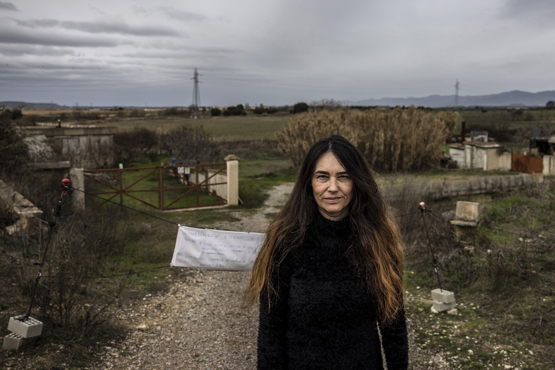 Meeting with Paz - a woman at the top of the pitch who is suing the regional government with Amazon as co-defendant, and is facing expropriation of her land in Cuarte, Huesca, Spain, on Wednesday, Feb. 11, 2026. Photographer: Angel Garcia/Bloomberg