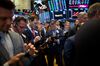Traders work on the floor of the New York Stock Exchange (NYSE) in New York, U.S., on Friday, June 8, 2018. Most U.S. equities drifted lower as global stocks lost momentum, with European and Asian peers retreating.
