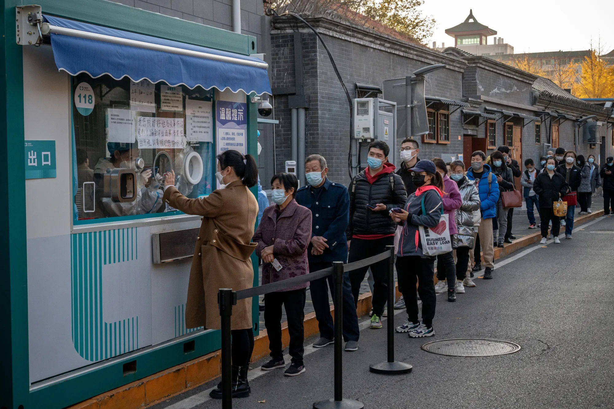 Residents at a Covid-19 testing booth in Beijing, on Nov. 14.