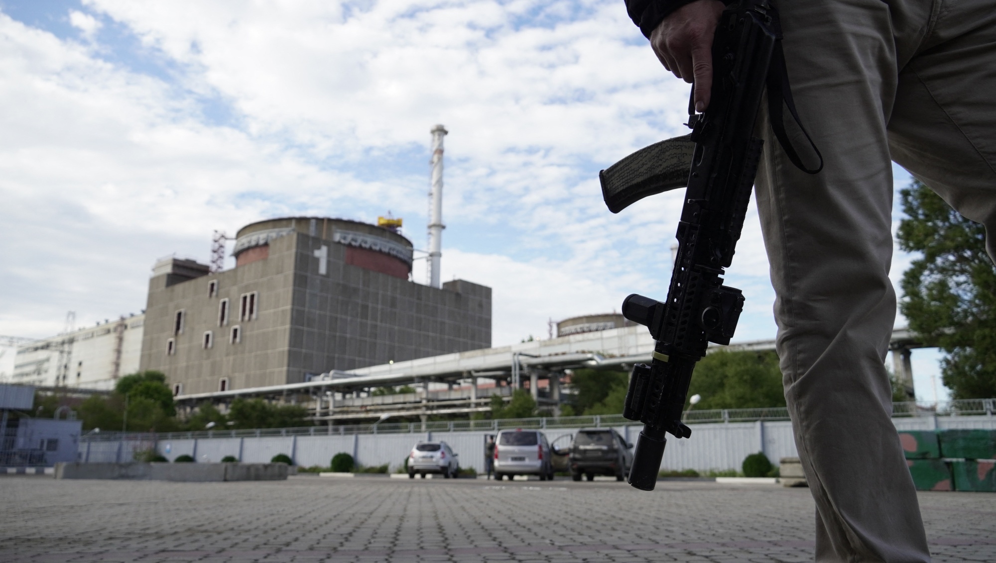 A Russian soldier guards Zaporizhzhia Nuclear Power Plant in southeastern Ukraine.