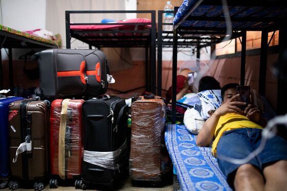 Virus Travel Ban Keeps Thousands of Maids From Hong Kong Jobs