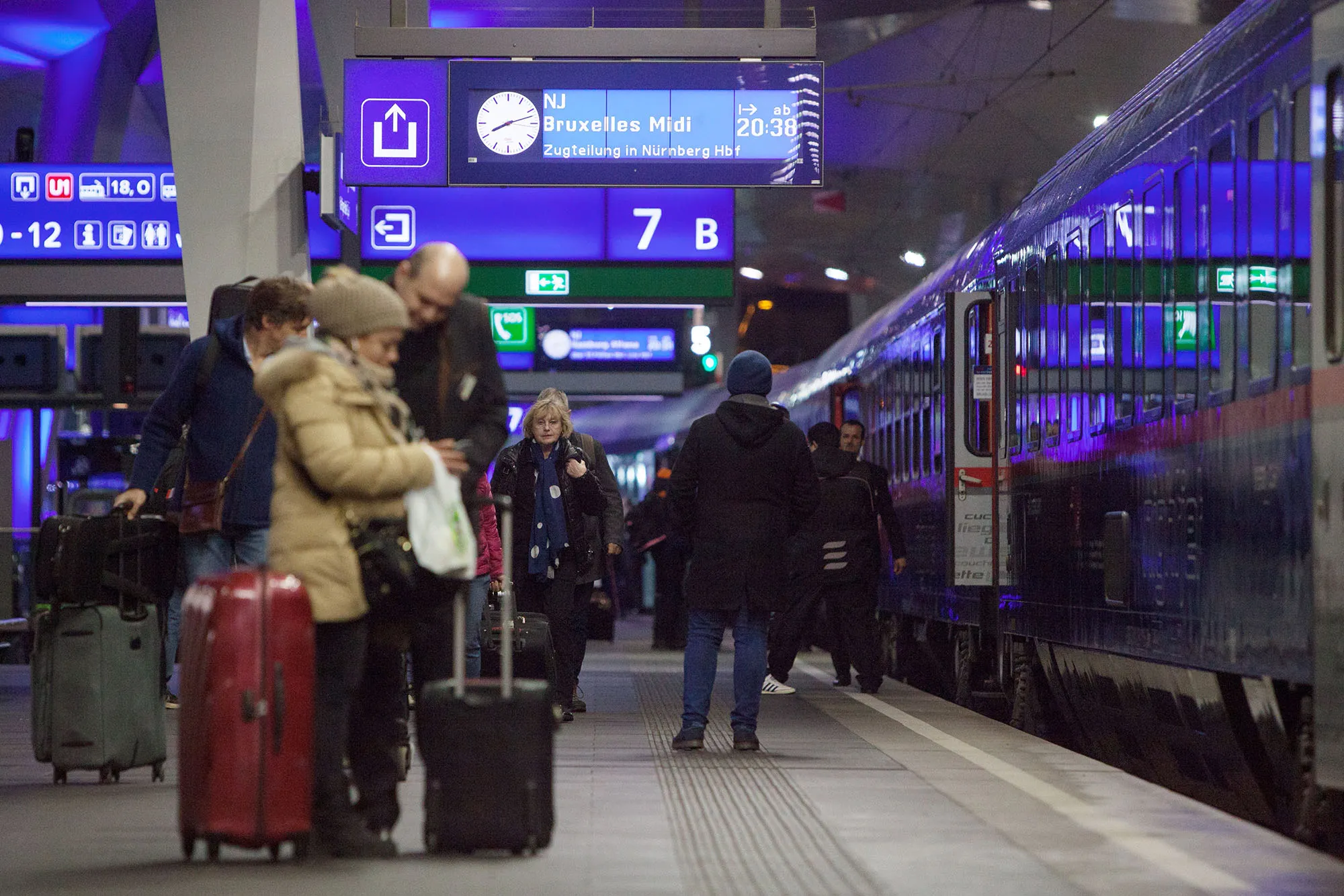 Passengers board a night train bound for Brussels in Vienna, Austria.