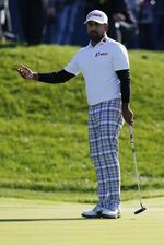 Anirban Lahiri, of India, reacts after missing a putt on the 18th hole during the third round of play in The Players Championship golf tournament Monday, March 14, 2022, in Ponte Vedra Beach, Fla. (AP Photo/Lynne Sladky)