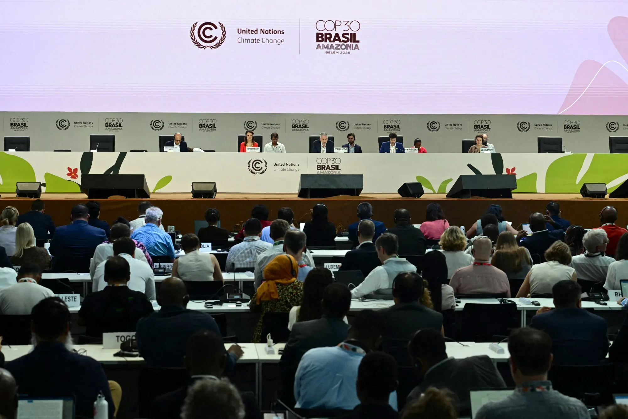 COP30 President Andre Correa do Lago, center, speaks during a plenary session of the COP30 UN Climate Change Conference in Belem, Para state, Brazil on November 21, 2025.